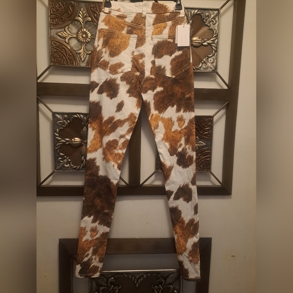 WeWoreWhat stiletto slit cow print jeans. - Picture 2 of 7